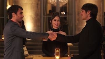 Emily in Paris. (L to R) Eugenio Franceschini as Marcello, Lily Collins as Emily, Lucas Bravo as Gabriel in episode 408 of Emily in Paris