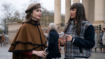 Emily in Paris. (L to R) Lily Collins as Emily, Thalia Besson as Genevieve in episode 407 of Emily in Paris