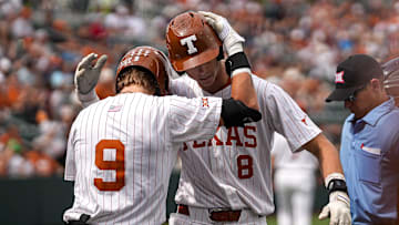 Texas Longhorns outfielder Jared Thomas (9) celebrates a home run by outfielder Will Gasparino (8) during the game against Washington at UFCU Disch   Falk Field on Saturday, March. 16, 2024 in Austin.