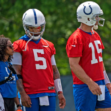 Colts quarterbacks, Anthony Richardson, from left, Joe Flacco and Kedon Slovis wait for the next drill during Indianapolis Colts minicamp practice Tuesday, June 4, 2024 at the Indiana Farm Bureau Football Center.