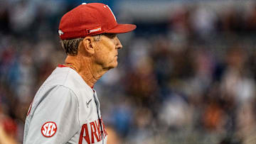 Jun 22, 2022; Omaha, NE, USA; Arkansas Razorbacks head coach Dave Van Horn walks off the field after defeating the Ole Miss Rebels at Charles Schwab Field. Mandatory Credit: Dylan Widger-Imagn Images