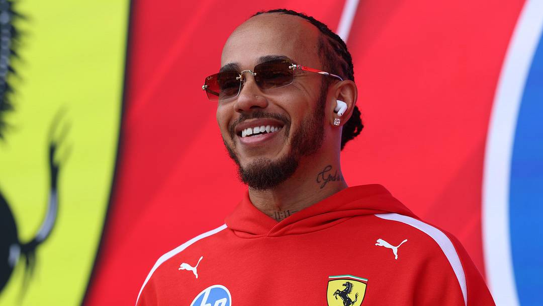 May 3, 2026; Miami Gardens, FL, USA; Ferrari driver Lewis Hamilton (44) before the Crypto.com Miami Grand Prix at Miami International Autodrome. Mandatory Credit: Nathan Ray Seebeck-Imagn Images