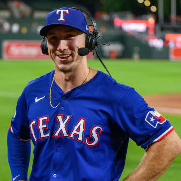 Jun 30, 2024; Baltimore, Maryland, USA; Texas Rangers outfielder Wyatt Langford (36) is interviewed following the game between the Baltimore Orioles and the Texas Rangers at Oriole Park at Camden Yards. Mandatory Credit: Reggie Hildred-USA TODAY Sports