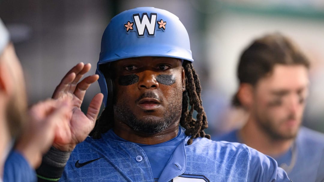 Mar 29, 2025; Washington, District of Columbia, USA; Washington Nationals designated hitter Josh Bell (19) celebrates after scoring a run during the eighth inning against the Philadelphia Phillies at Nationals Park.
