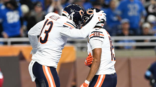 Chicago Bears wide receiver Keenan Allen celebrates with wide receiver Rome Odunze after catching a touchdown pass