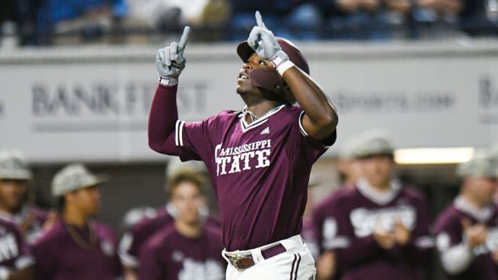 Mississippi State outfielder Dakota Jordan (42) hits a two run home run against Ole Miss in the 6th inning at Swayze Field in Oxford, Miss., on Friday, Apr. 12, 2024.