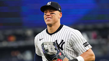 Apr 12, 2025; Bronx, New York, USA; New York Yankees outfielder Aaron Judge (99) reacts after catching a pop fly against the San Francisco Giants during the eighth inning at Yankee Stadium. 