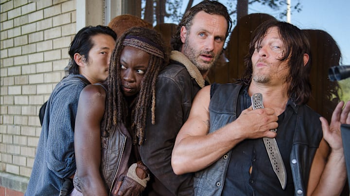 Steven Yeun as Glenn Rhee, Danai Gurira as Michonne, Andrew Lincoln as Rick Grimes, and Norman Reedus as Daryl Dixon - The Walking Dead season 6