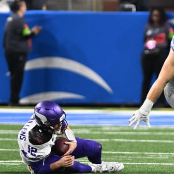 Jan 7, 2024; Detroit, Michigan, USA; Detroit Lions defensive end Aidan Hutchinson (97) celebrates after sacking Minnesota Vikings quarterback Nick Mullens (12) in the second quarter at Ford Field. Mandatory Credit: Lon Horwedel-USA TODAY Sports