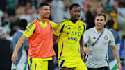 [US, Mexico & Canada customers only] Feb 13, 2024; Jeddah, Saudi Arabia;  Al Nassr players Jhon Duran and Cristiano Ronaldo celebrate after a Saudi Pro League soccer match at King Abdullah Sports City. Mandatory Credit: Reuters via Imagn Images