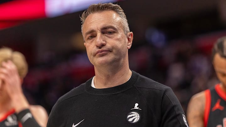 Mar 31, 2026; Detroit, Michigan, USA; Toronto Raptors head coach Darko Rajakovic walks off the court after loosing to the Detroit Pistons at Little Caesars Arena. Mandatory Credit: David Reginek-Imagn Images