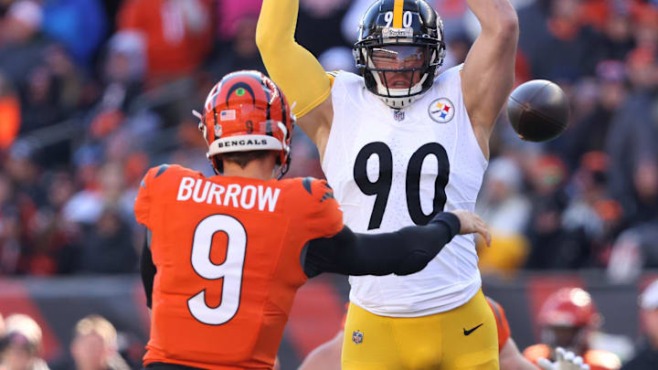 Dec 1, 2024; Cincinnati, Ohio, USA;  Pittsburgh Steelers linebacker T.J. Watt (90) attempts to block the pass from Cincinnati Bengals quarterback Joe Burrow (9) during the first quarter at Paycor Stadium. Mandatory Credit: Joseph Maiorana-Imagn Images