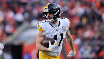 Dec 1, 2024; Cincinnati, Ohio, USA; Pittsburgh Steelers linebacker Payton Wilson (41) picks up the fumble en route to scoring a defensive touchdown during the fourth quarter against the Cincinnati Bengals at Paycor Stadium. Mandatory Credit: Joseph Maiorana-Imagn Images