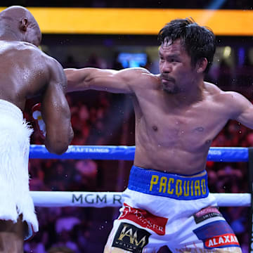 Manny Pacquiao fights Yordenis Ugas in a world welterweight championship bout at T-Mobile Arena. 
