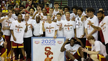Nov 26, 2025; Lahaina, HI, USA; USC Trojans take a team photo after they defeated the Arizona State Sun Devils in the championship match at Lahaina Civic Center. Mandatory Credit: Marco Garcia-Imagn Images