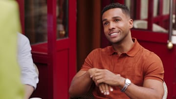 Emily in Paris. Lucien Laviscount as Alfie in episode 410 of Emily in Paris. 