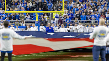 Nov 24, 2022; Detroit, Michigan, USA; Fans stand for the National Anthem before the start of the game between the Detroit Lions and the Buffalo Bills at Ford Field. Mandatory Credit: David Reginek-Imagn Images