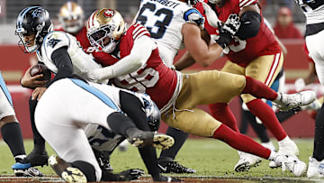 Nov 24, 2025; Santa Clara, California, USA; San Francisco 49ers defensive end Clelin Ferrell (96) sacks Carolina Panthers quarterback Bryce Young (9) during the second half at Levi's Stadium. Mandatory Credit: Kelley L Cox-Imagn Images