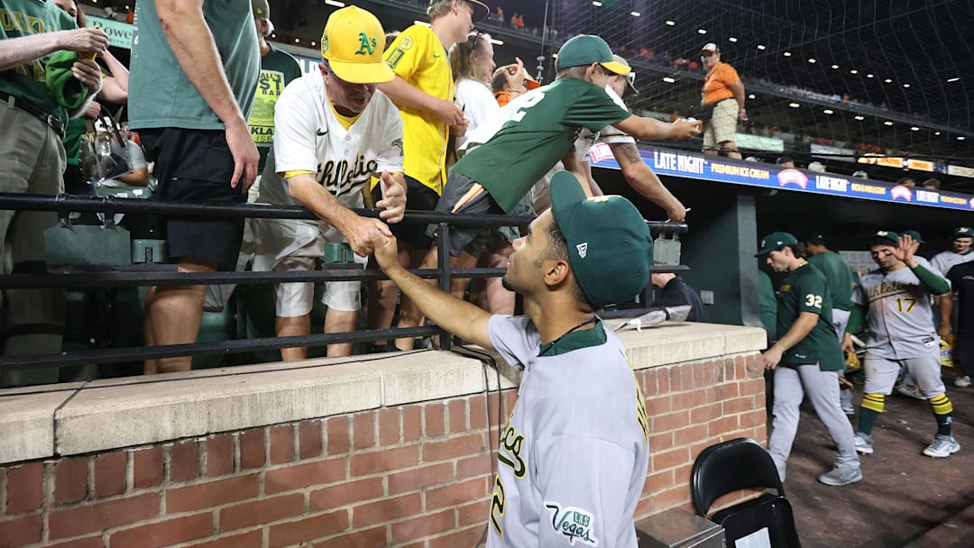 Aug 9, 2025; Baltimore, Maryland, USA; Athletics third baseman Darell Hernaiz (2) greets fans after a game against the Baltimore Orioles at Oriole Park at Camden Yards. Mandatory Credit: Daniel Kucin Jr.-Imagn Images