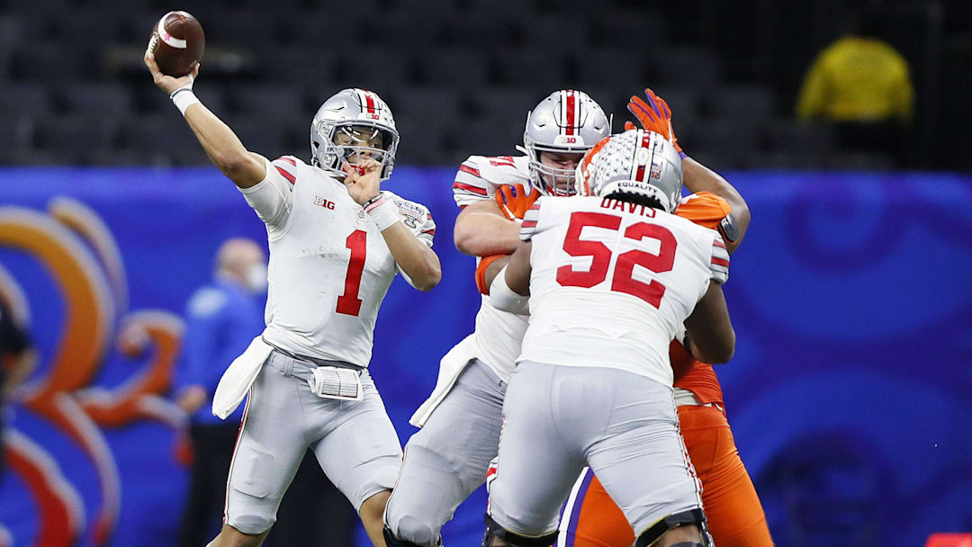 Ohio State Buckeyes quarterback Justin Fields (1) throws the ball against Clemson Tigers in the third quarter during the College Football Playoff semifinal at the Allstate Sugar Bowl in the Mercedes-Benz Superdome in New Orleans on Friday, Jan. 1, 2021.