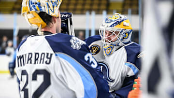 Goaltenders Matthew Murray and Magnus Chrona take after a Milwaukee Admirals practice open to season ticket holders Wednesday, October 16, 2024, at the UW-Milwaukee Panther Arena in Milwaukee, Wisconsin.