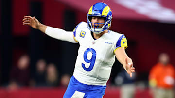 Dec 7, 2025; Glendale, Arizona, USA; Los Angeles Rams quarterback Matthew Stafford (9) reacts against the Arizona Cardinals during the second half at State Farm Stadium. Mandatory Credit: Mark J. Rebilas-Imagn Images