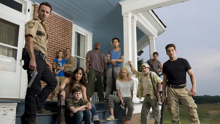 Andrew Lincoln, Madison Lintz, Melissa Suzanne McBride, Sarah Wayne Callies, Chandler Riggs, IronE Singleton, Steven Yeun, Laurie Holden, Jeffrey DeMunn, Norman Reedus, and Jon Bernthal - The Walking Dead _ Season 2 _ Gallery - Photo Credit: Matthew Welch/AMC