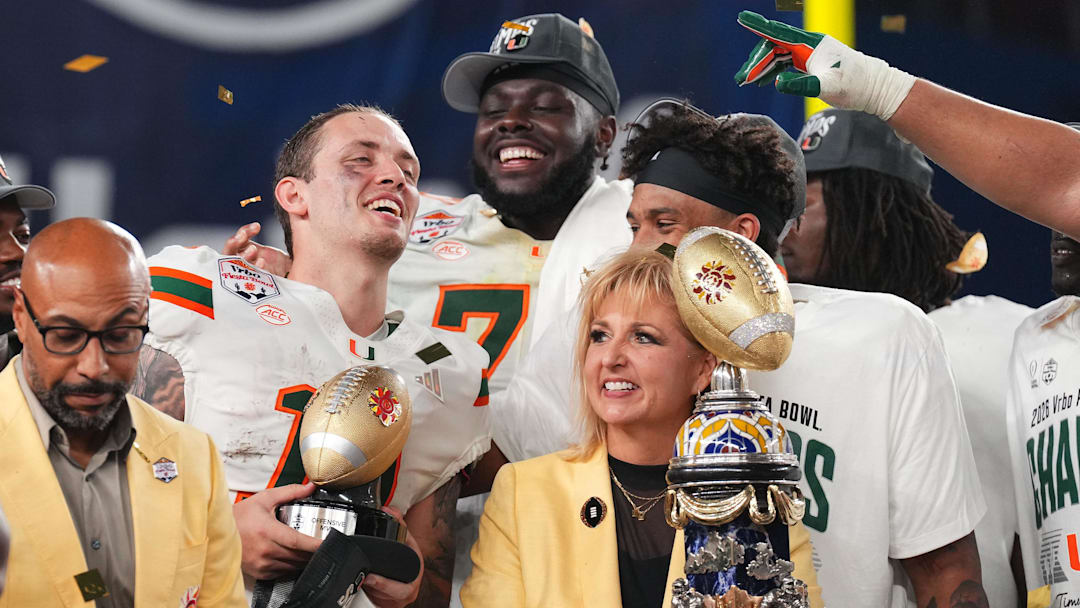 Jan 8, 2026; Glendale, AZ, USA; Miami Hurricanes quarterback Carson Beck (11) reacts after winning the 2026 Fiesta Bowl and semifinal game of the College Football Playoff at State Farm Stadium. Mandatory Credit: Joe Camporeale-Imagn Images