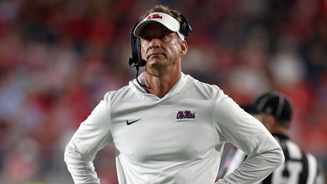 Nov 15, 2025; Oxford, Mississippi, USA; Mississippi Rebels head coach Lane Kiffin looks on during a time out during the first quarter against the Florida Gators at Vaught-Hemingway Stadium. Mandatory Credit: Petre Thomas-Imagn Images