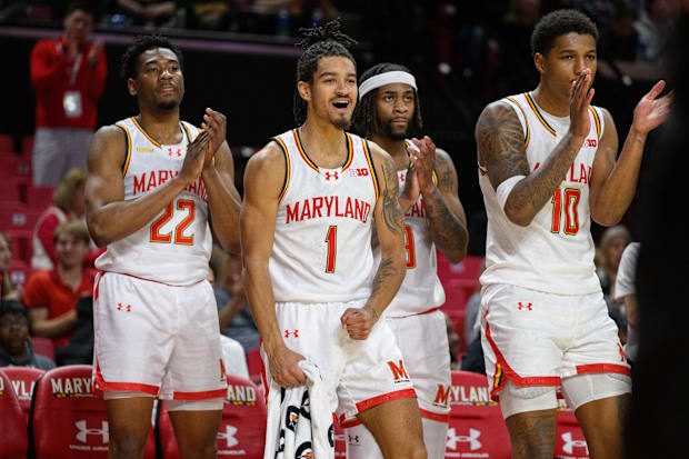 Maryland Terrapins guard Rodney Rice (1), forward Jordan Geronimo (22), and forward Julian Reese (10) celebrate.