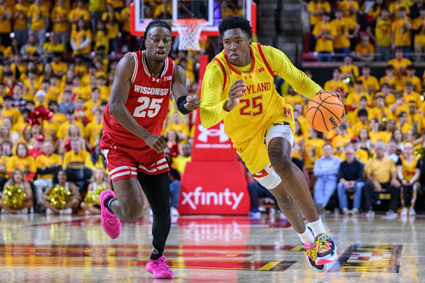 Jan 29, 2025; College Park, Maryland, USA; Maryland Terrapins center Derik Queen (25) drives to the basket against Wisconsin 