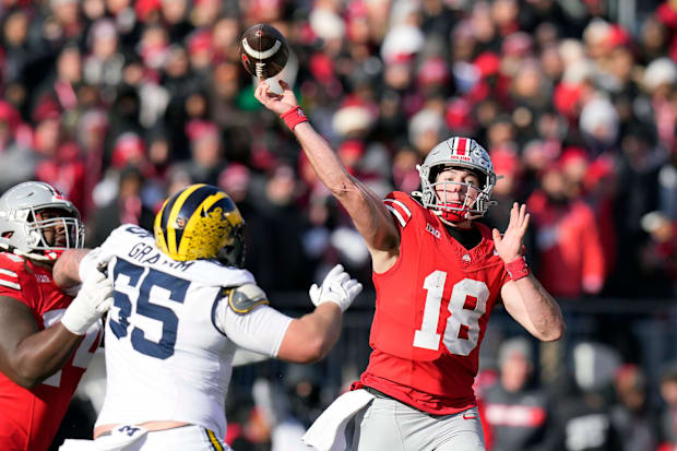 Ohio State quarterback Will Howard throws the ball against the  Michigan Wolverines during the second quarter.