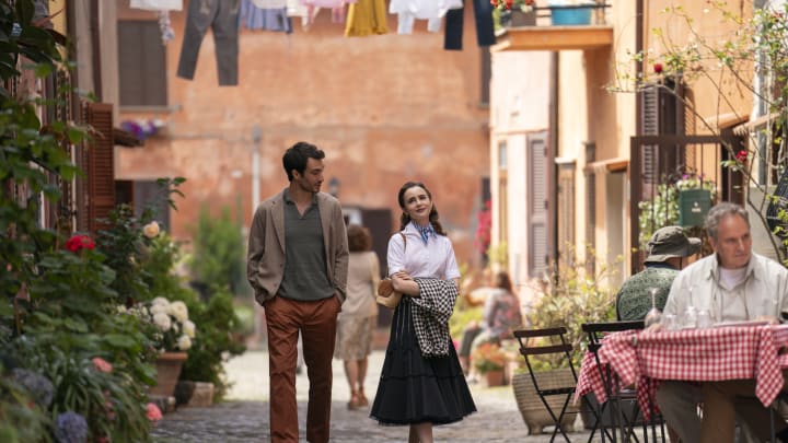 Emily in Paris. (L to R) Eugenio Franceschini as Marcello, Lily Collins as Emily in episode 410 of Emily in Paris