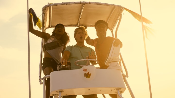 Outer Banks. (L to R) Carlacia Grant as Cleo, Rudy Pankow as JJ, Jonathan Daviss as Pope in episode 401 of Outer Banks