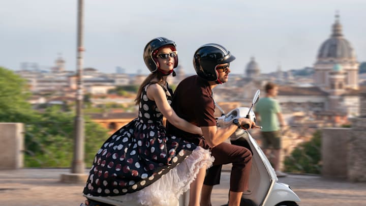 Emily in Paris. (L to R) Lily Collins as Emily, Eugenio Franceschini as Marcello in Emily in Paris