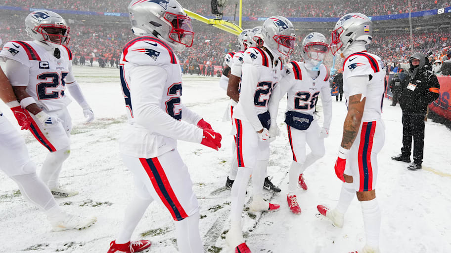 Patriots celebrating in the snow.