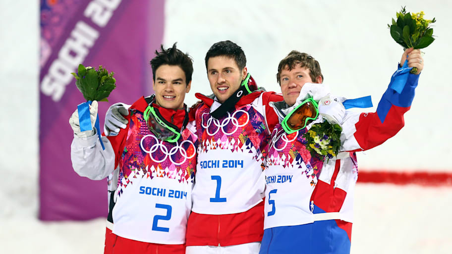 Alex Bilodeau (CAN, center) wins gold, Mikael Kingsbury (CAN, left) wins silver,