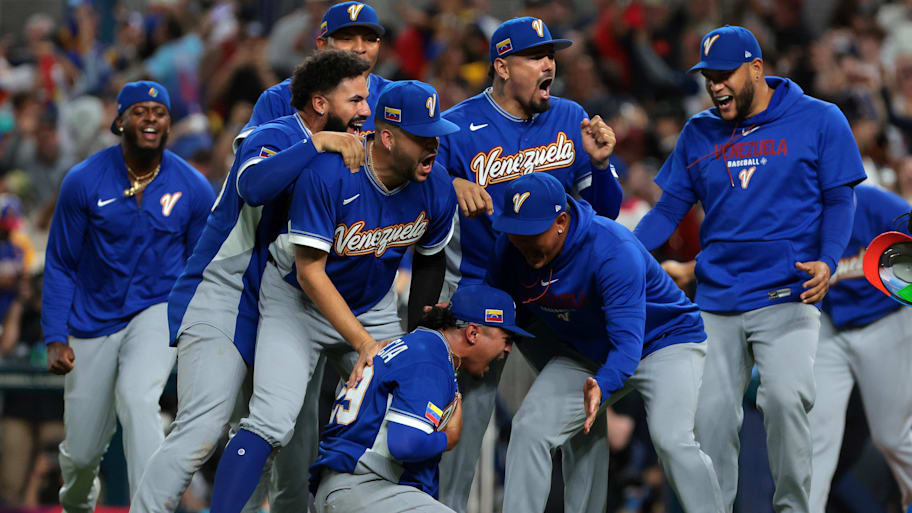 Venezuela pitcher Daniel Palencia (29) reacts after defeating the United States