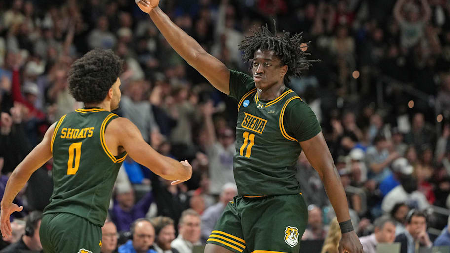 Siena players react during their game against Duke