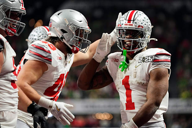 Ohio State RB Quinshon Judkins celebrates a rushing touchdown against Notre Dame Fighting Irish in the National Championship.