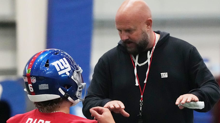 New York Giants quarterback Jaxson Dart and coach Brian Daboll