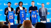 From left, Ajay Mitchell, Dillon Jones and Nikola Topic stand with Thunder general manager Sam Presti during an introductory press conference for the 2024 Thunder draft picks at Oklahoma Contemporary Arts Center in Oklahoma City, Saturday, June, 29, 2024.