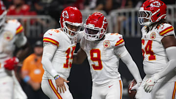 Sep 22, 2024; Atlanta, Georgia, USA; Kansas City Chiefs quarterback Patrick Mahomes (15) and wide receiver JuJu Smith-Schuster (9) celebrate after a touchdown against the Atlanta Falcons in the third quarter at Mercedes-Benz Stadium. Mandatory Credit: Brett Davis-Imagn Images