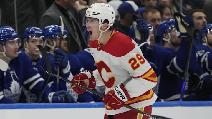 Oct 28, 2025; Toronto, Ontario, CAN; Calgary Flames forward Samuel Honzek (29) celebrates his goal against the Toronto Maple Leafs during the third period at Scotiabank Arena. Mandatory Credit: John E. Sokolowski-Imagn Images