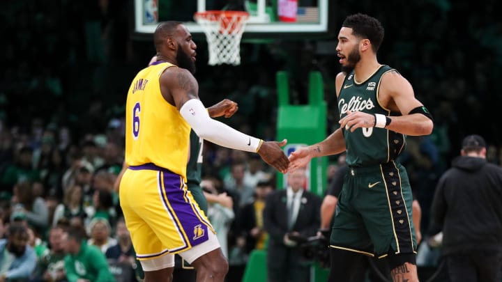 Jan 28, 2023; Boston, Massachusetts, USA; Boston Celtics forward Jayson Tatum (0) and Los Angeles Lakers forward LeBron James (6) react before playing at TD Garden. Mandatory Credit: Paul Rutherford-USA TODAY Sports