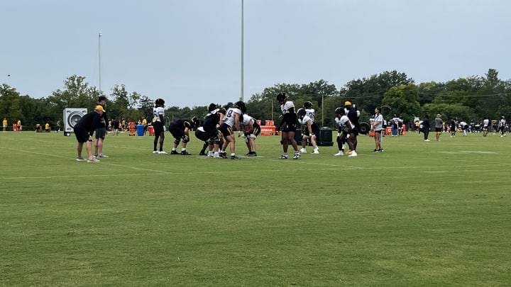 Linebackers and offensive linemen run through a drill at Missouri Tigers practice on Thursday, August 9.