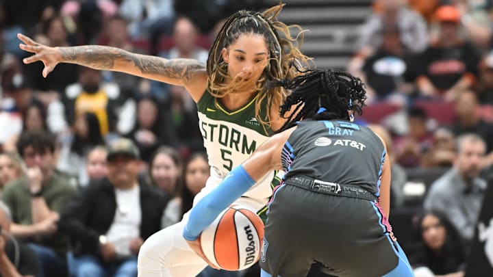Aug 15, 2025; Vancouver, British Columbia, CAN;  Atlanta Dream guard Allisha Gray (15) dribbles defended by Seattle Storm forward Gabby Williams (5) during the second half at Rogers Arena. Mandatory Credit: Anne-Marie Sorvin-Imagn Images 