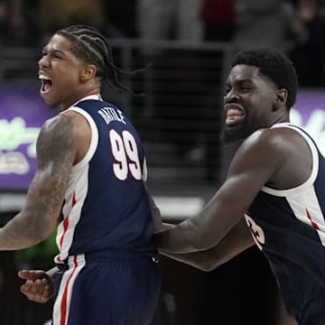 Gonzaga Bulldogs guard Khalif Battle (99) and forward Graham Ike (13). 