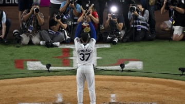 Jul 15, 2024; Arlington, TX, USA; National League outfielder Teoscar Hernandez of the Los Angeles Dodgers (37) poses with the trophy after he wins the 2024 All Star Game Home Run Derby at Globe Life Field. Mandatory Credit: Jerome Miron-USA TODAY Sports