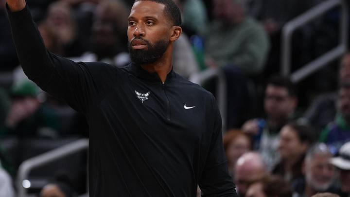 Apr 7, 2026; Boston, Massachusetts, USA; Charlotte Hornets head coach Charles Lee watches from the sideline as they take on the Boston Celtics at TD Garden. Mandatory Credit: David Butler II-Imagn Images